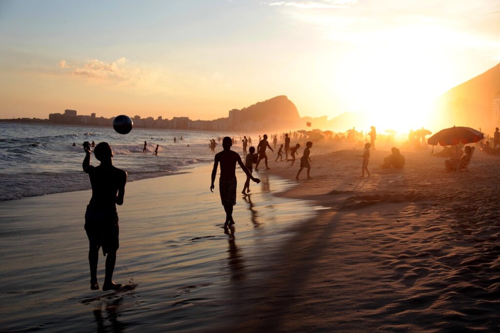 people, beach, sea, coast, nature, sand, tourists, rio, brazil, soccer, football, ball, playing, ray, ocean, copacabana, sunset, rio de janeiro
